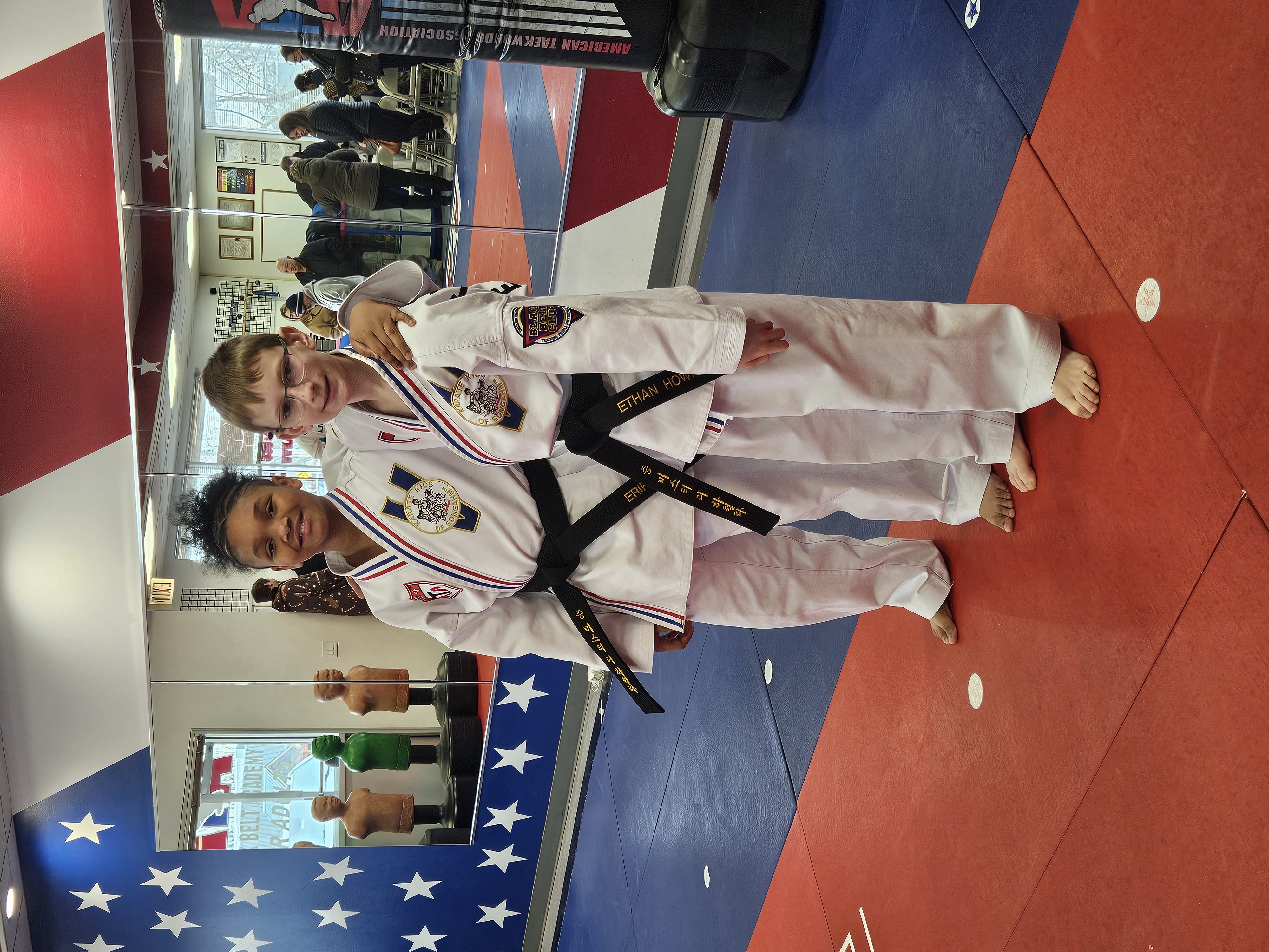 Karate Kids students posing proudly in uniform