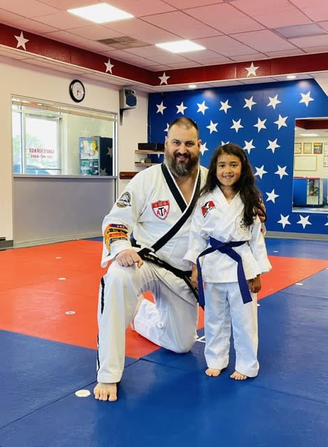Tiny Tigers student practicing a kick at North Canton ATA